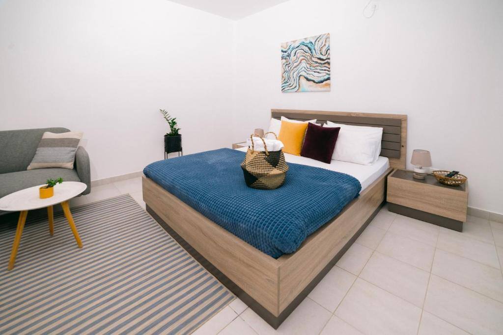 Spacious apartment with bed, sofa and coffee table